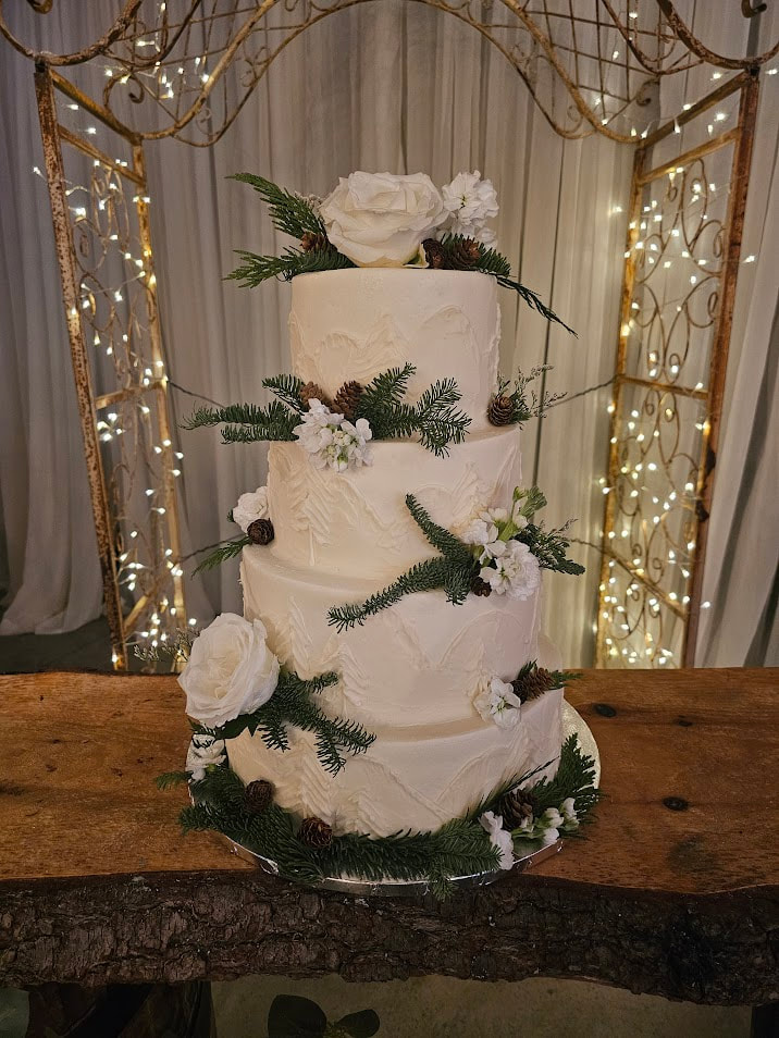 Four-tier ivory wedding cake